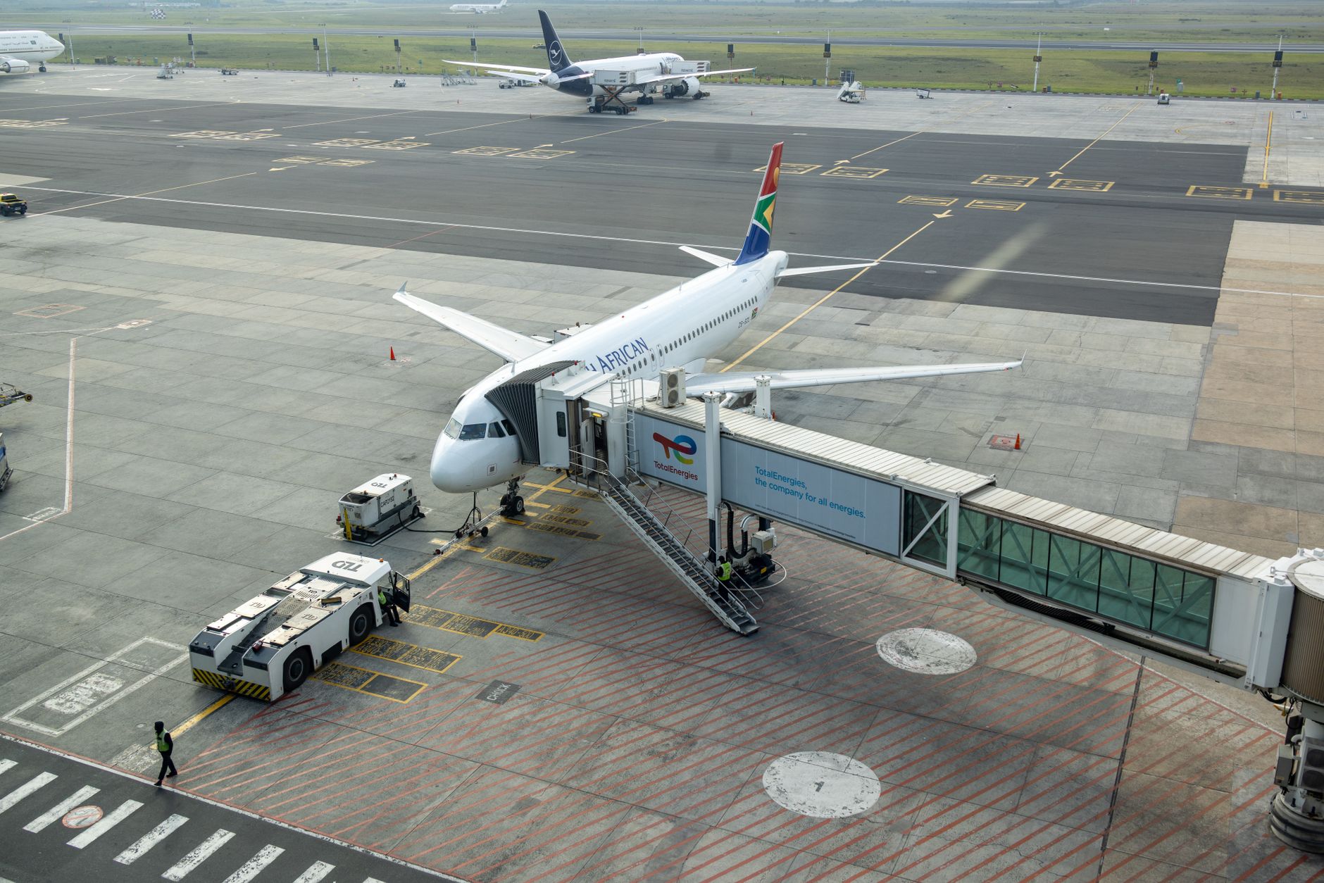 south african airways aircraft at airport gate